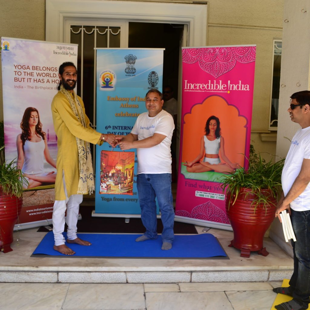Being honoured by the ambassador of India to Greece after conducting the International Day of Yoga 2020 at the Indian Embassy in Athens, Greece.